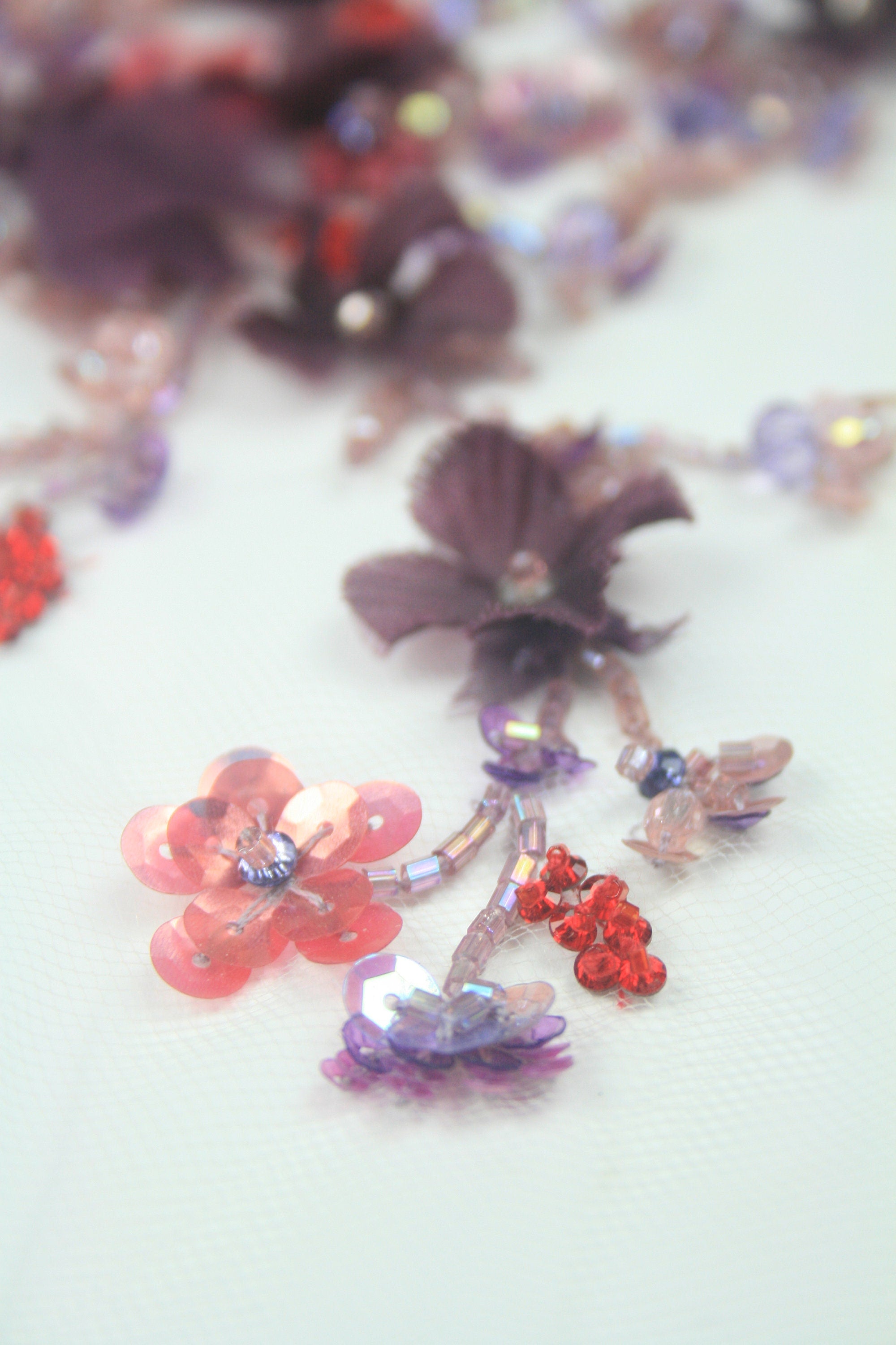 C106 - Plum Red Floral Applique