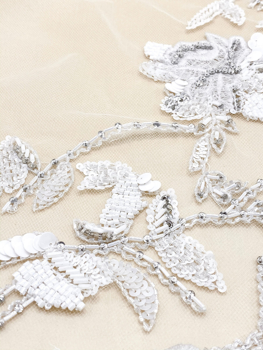 Haute Couture Fabric,Beaded Floral appliquÃ©s on tulle,Modern Bridal Fabric, Rhinestones and Crystals on tulle.