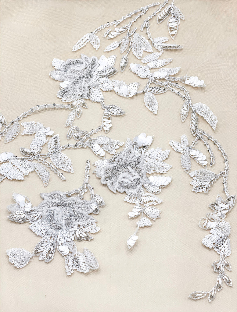 Haute Couture Fabric,Beaded Floral appliquÃ©s on tulle,Modern Bridal Fabric, Rhinestones and Crystals on tulle.
